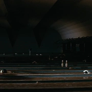 Scene of Yuri and Ken in the car during the rainy night